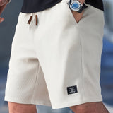 Magnus | Shorts med elastisk talje og snøre